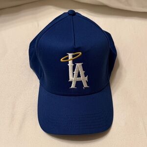 NWOT Blue Baseball Cap with Embroidered Logo